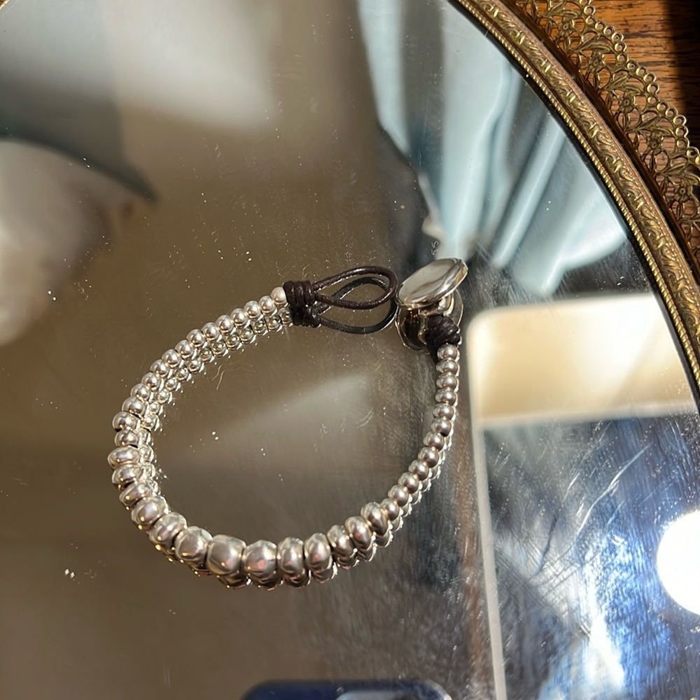 Uno de 50 leather and silver bracelet